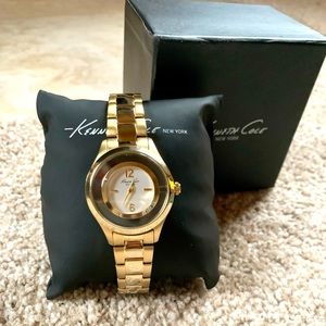 Kenneth Cole New York two-tone gold women’s watch.